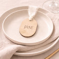 Load image into Gallery viewer, Détail gravure prénom sur porte-nom mariage en bois naturel
